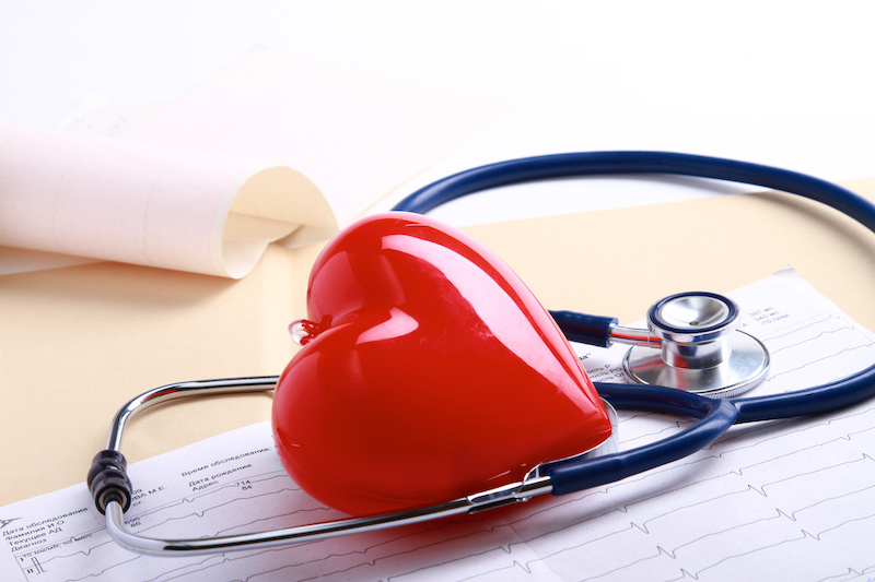 Close up of a red heart and a stethoscope